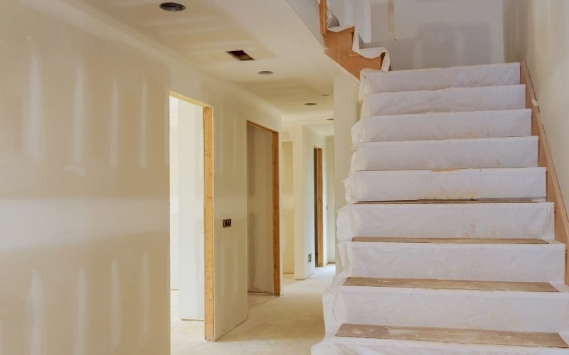 New home interior construction of housing with drywall installed
